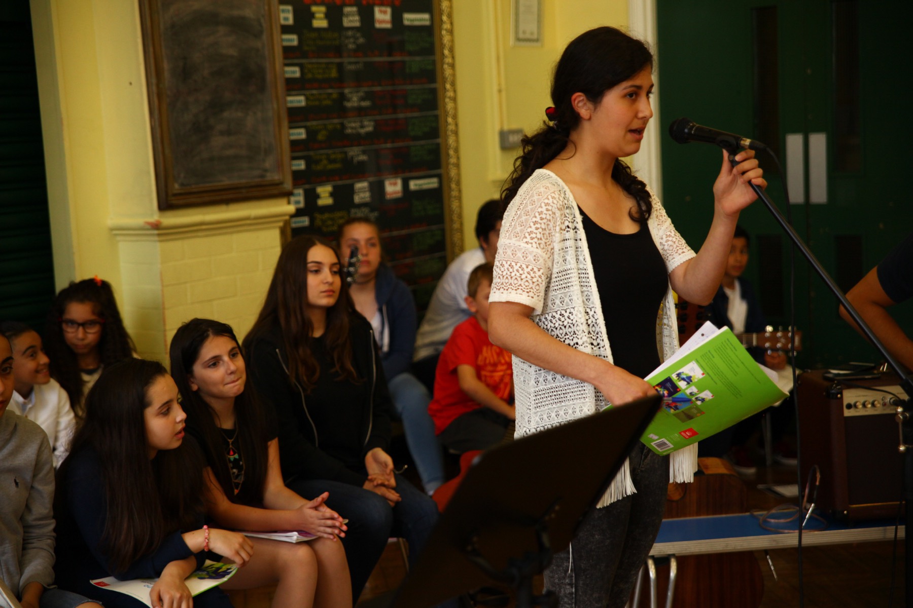 A student singing at the Penguin Music School end-of-year concert